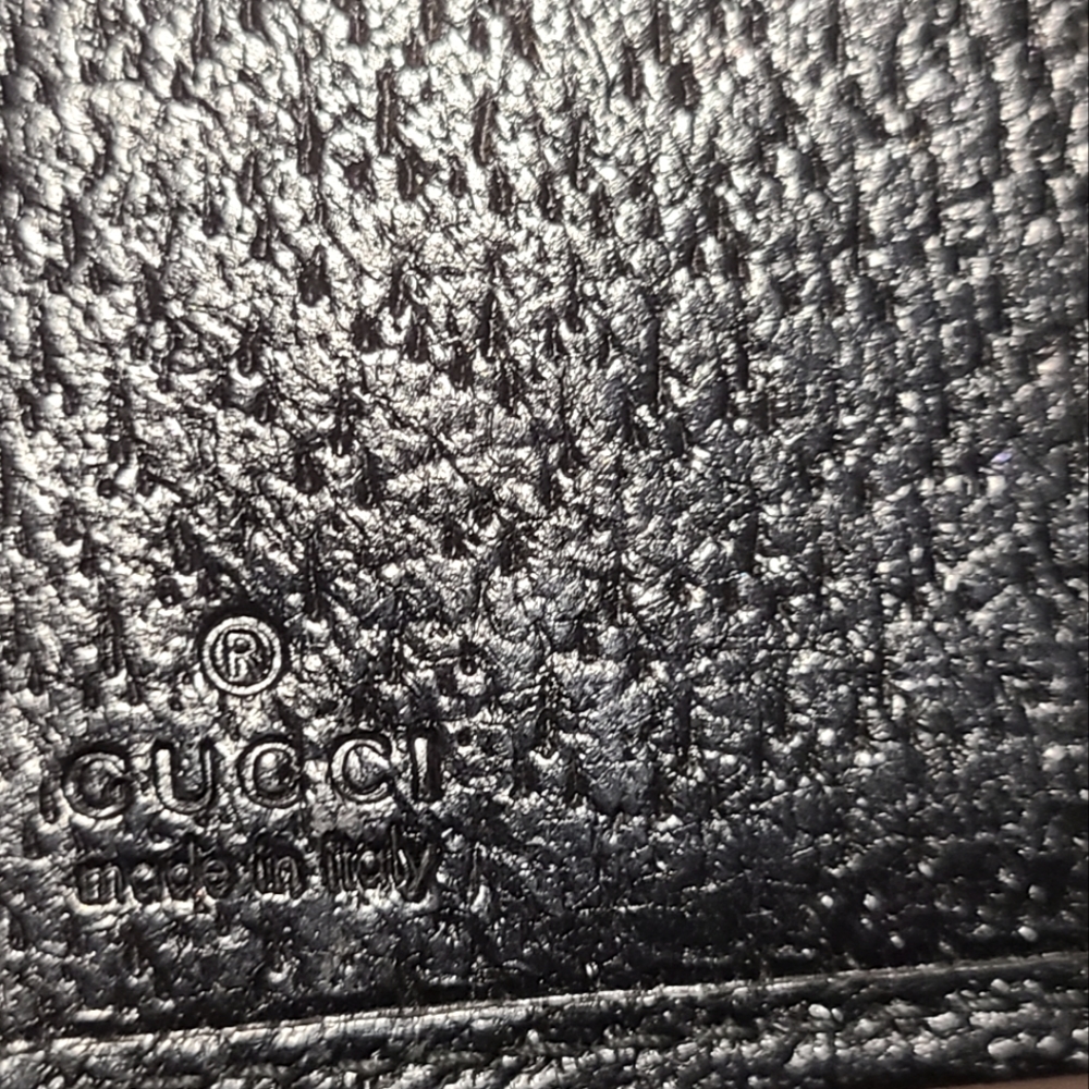 GG Monogram Canvas Bi-fold wallet